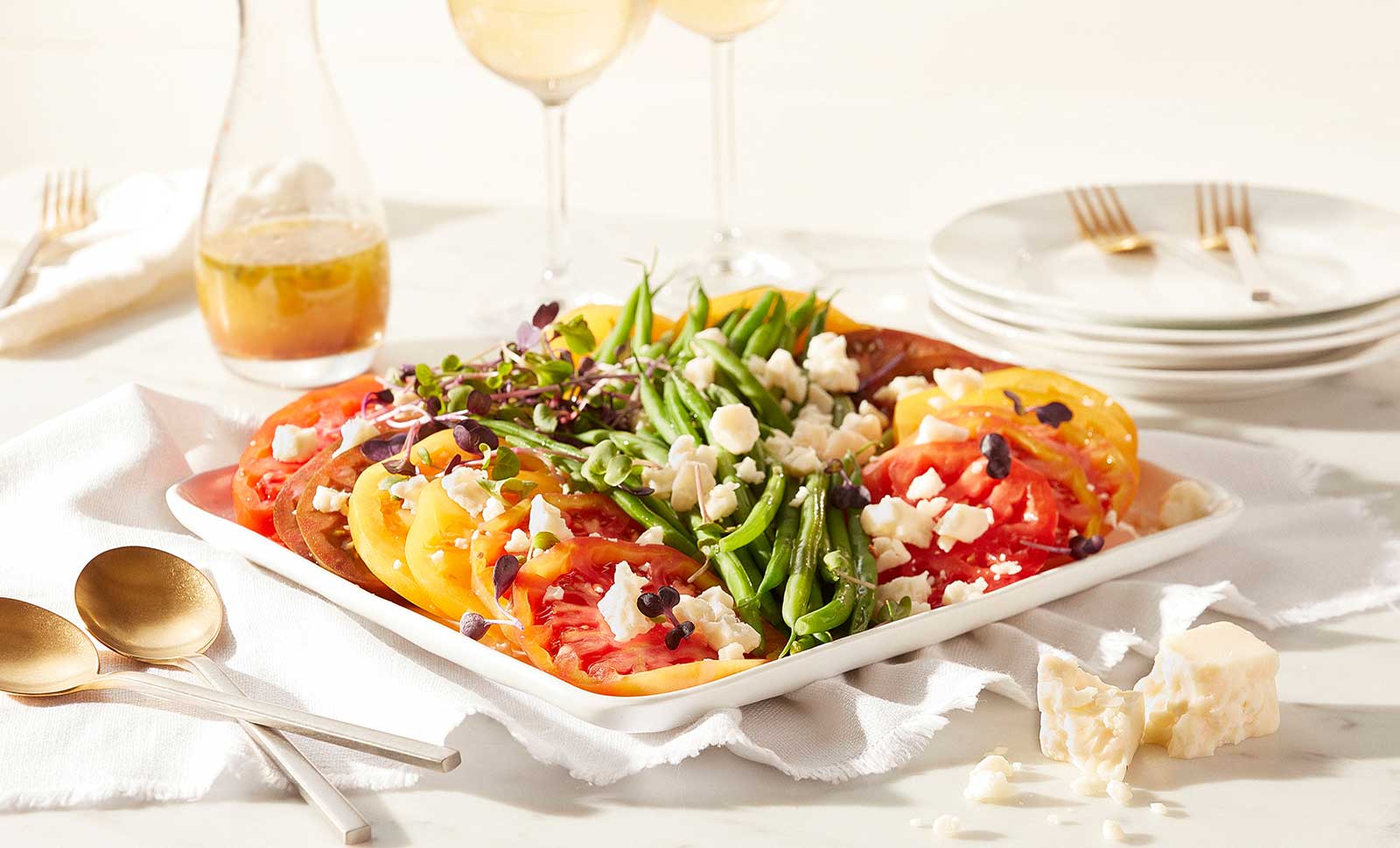 A plate of heirloom tomato and green bean salad.