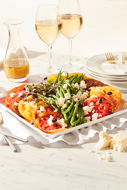 A plate of heirloom tomato and green bean salad.